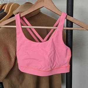 Neon coral strapped sports bra